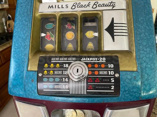 1940's Mills Black Beauty High Top Dollar Slot Machine Image