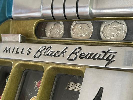 1940's Mills Black Beauty High Top Dollar Slot Machine Image