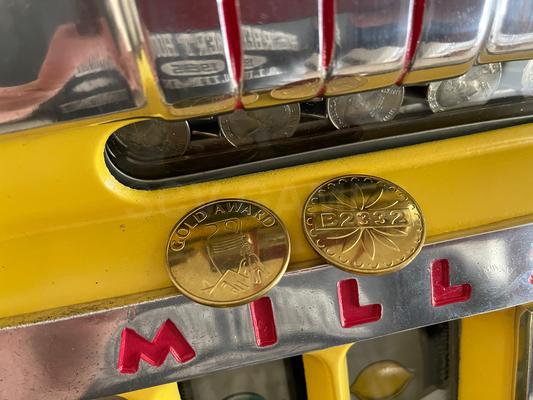 1940's Mills High Top 777 Bell 25 Cent Slot Machine Image