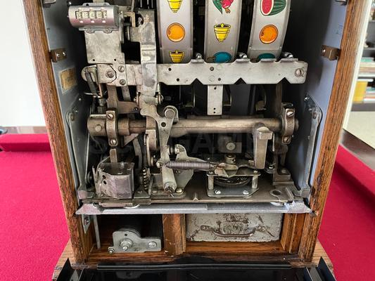 1940's Mills High Top 777 Bell 25 Cent Slot Machine Image