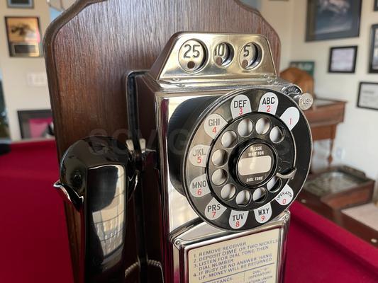 1960's Western Electric 233 Chrome 3-Slot Payphone Image