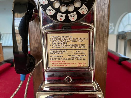 1960's Western Electric 233 Chrome 3-Slot Payphone Image